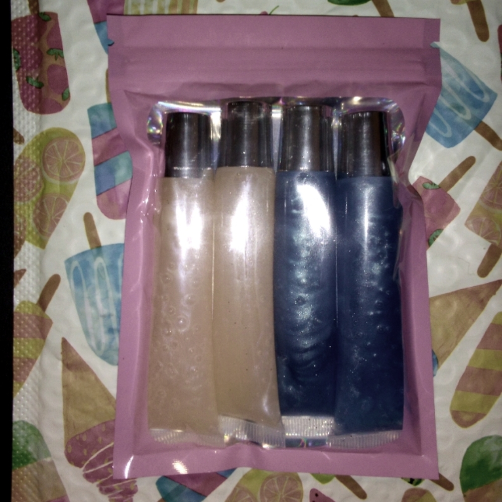 Set of Four Lip Plumper Tubes in Neutral and Blue Shades
